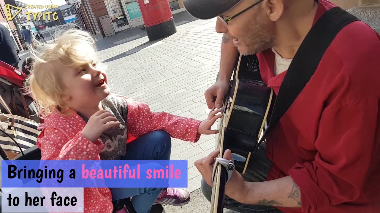 6 year old girl who is blind and autistic plays guitar for the first time